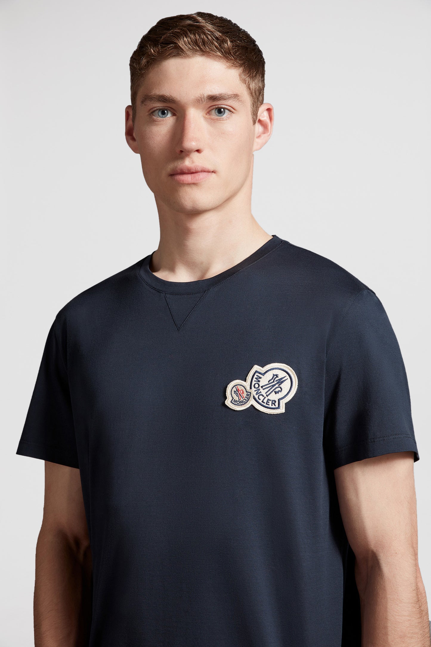 Moncler logo T-shirt,luxury blue T-shirt,designer casual wear,high-end fashion,exclusive men's apparel