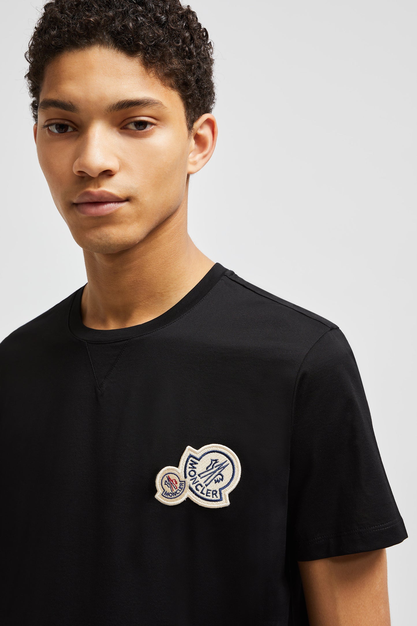 Black T-shirt, Moncler logo, luxury casual wear, designer T-shirt, premium material