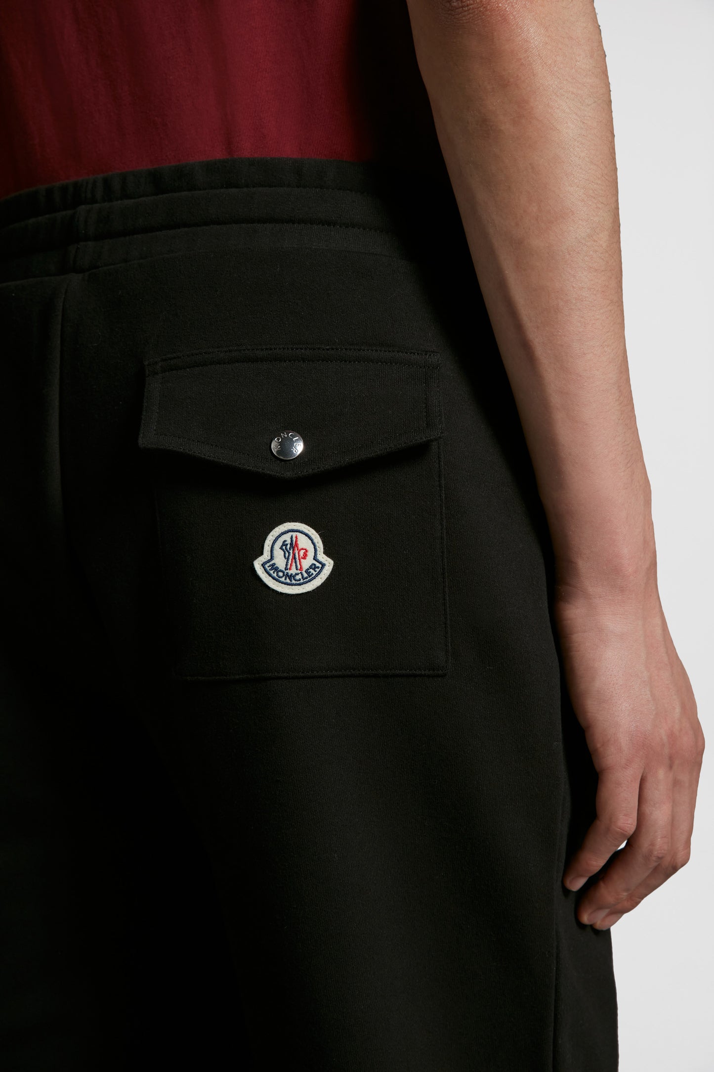 Moncler jogging pants, luxury athleisure, black logo pants, designer joggers, premium comfort wear