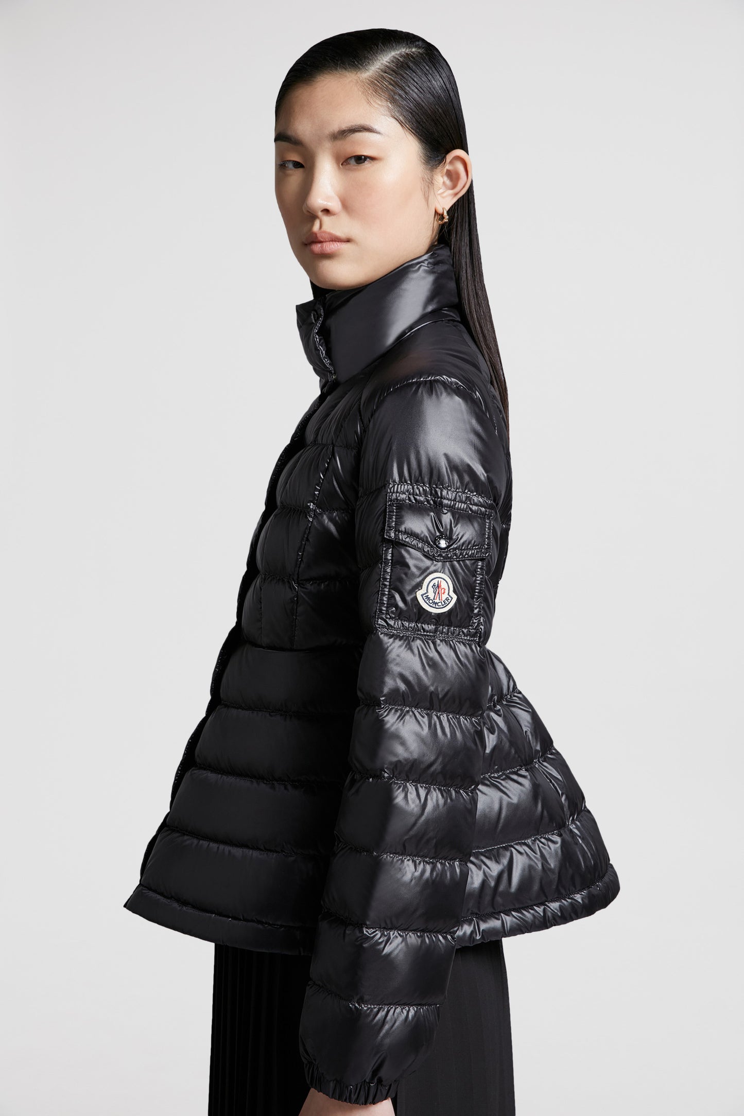 luxury outerwear, black down jacket, Moncler jacket, winter fashion, high-end fashion