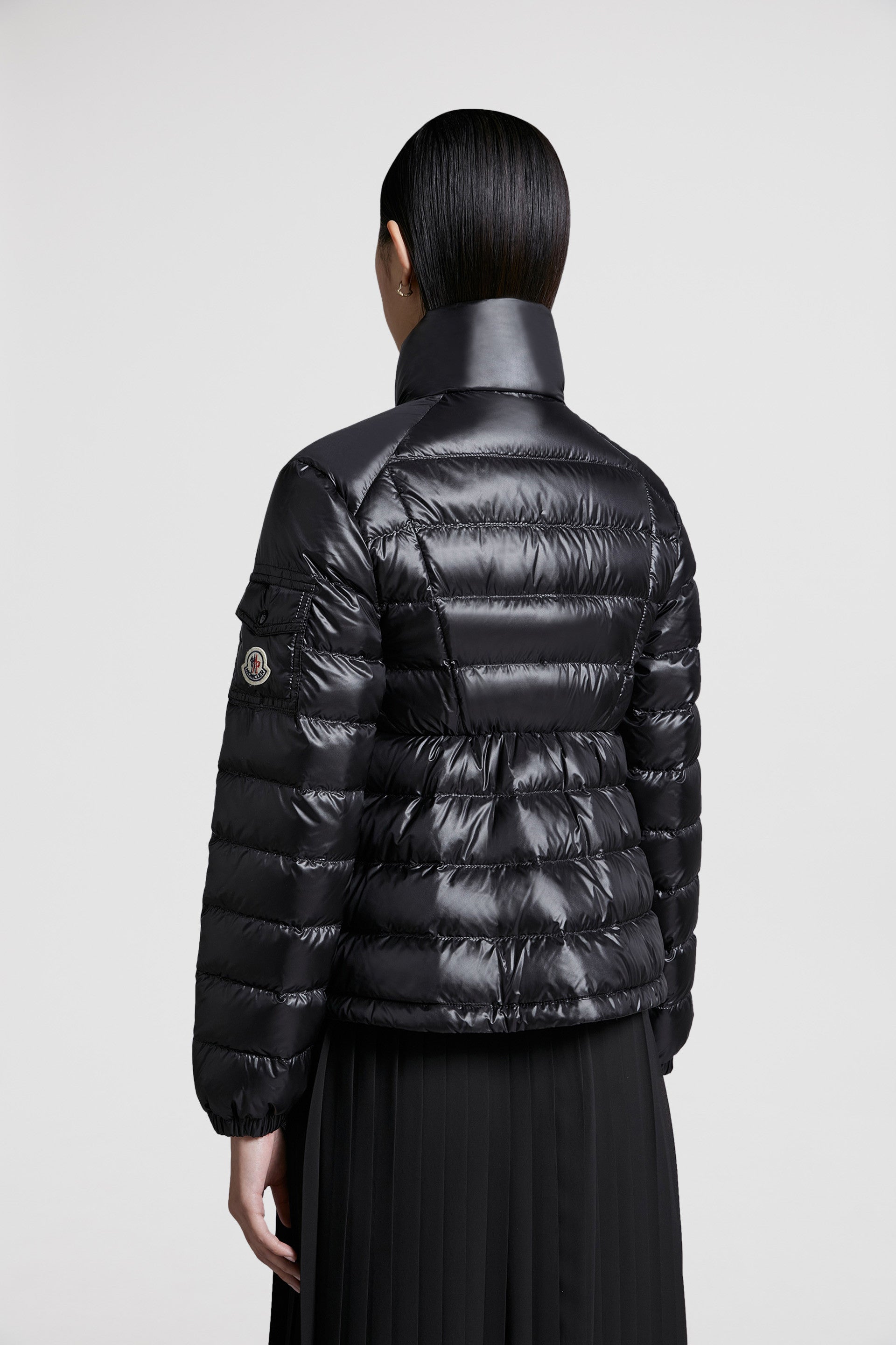 luxury outerwear, black down jacket, Moncler jacket, winter fashion, high-end fashion