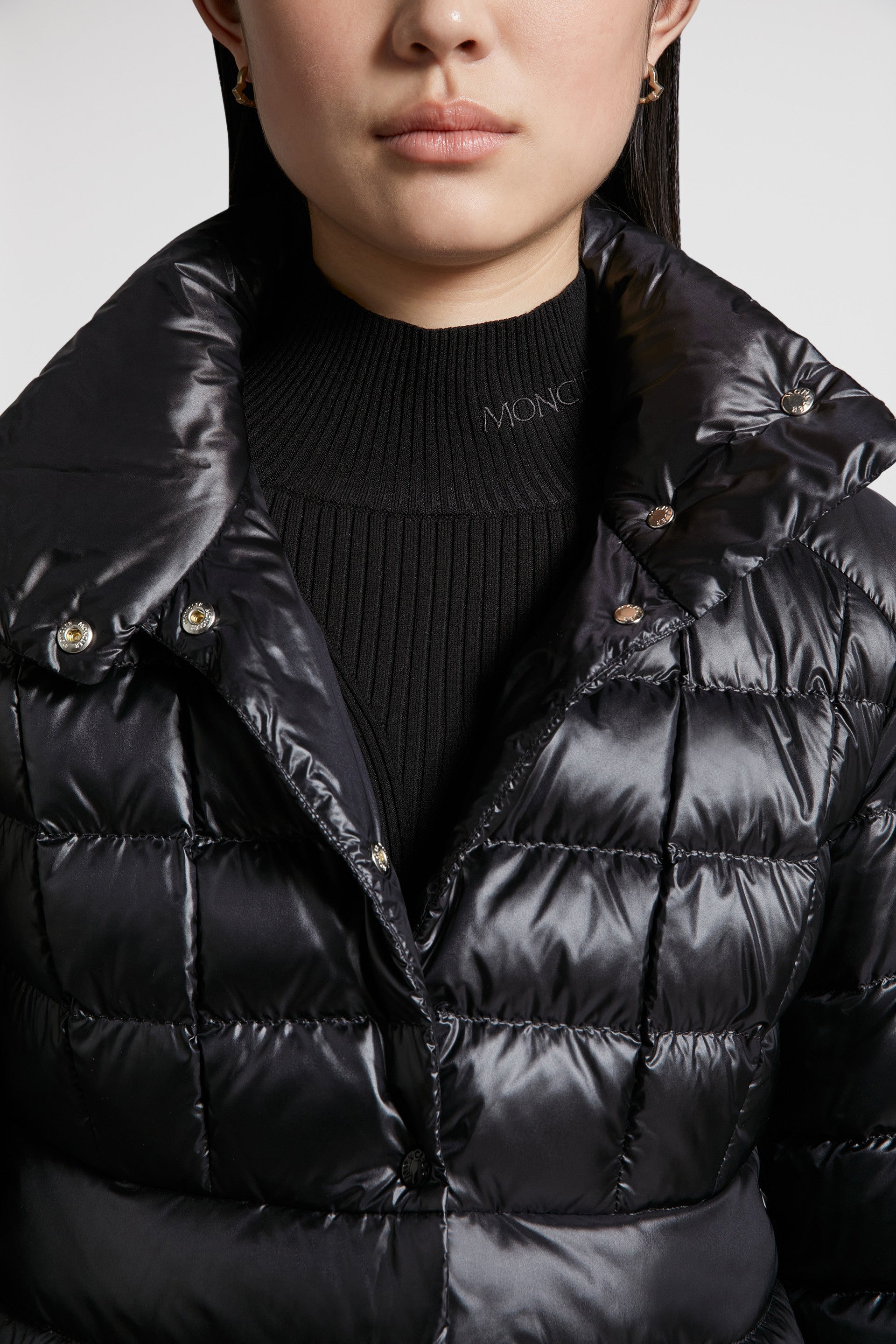 luxury outerwear, black down jacket, Moncler jacket, winter fashion, high-end fashion