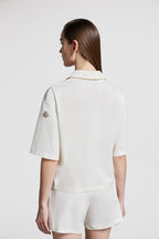 Moncler polo shirt, luxury casual polo, classic white polo, high-end fashion, refined elegance