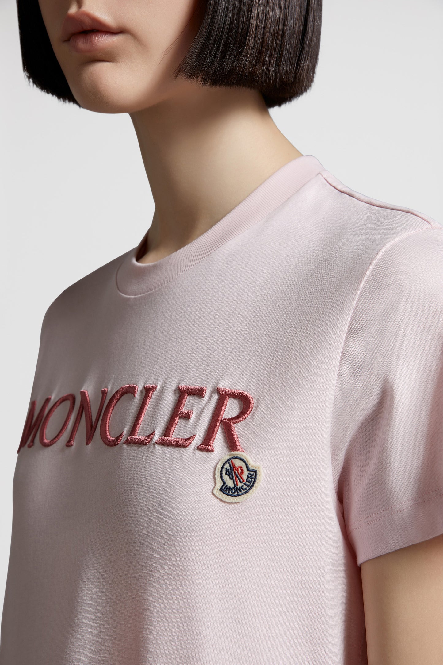 luxury T-shirt, Moncler logo shirt, pink designer T-shirt, high-end casual wear, elegant logo T-shirt