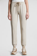 beige jogging pants, Moncler, logo jogging pants, luxury loungewear, cotton joggers