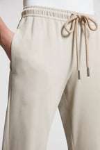 beige jogging pants, Moncler, logo jogging pants, luxury loungewear, cotton joggers