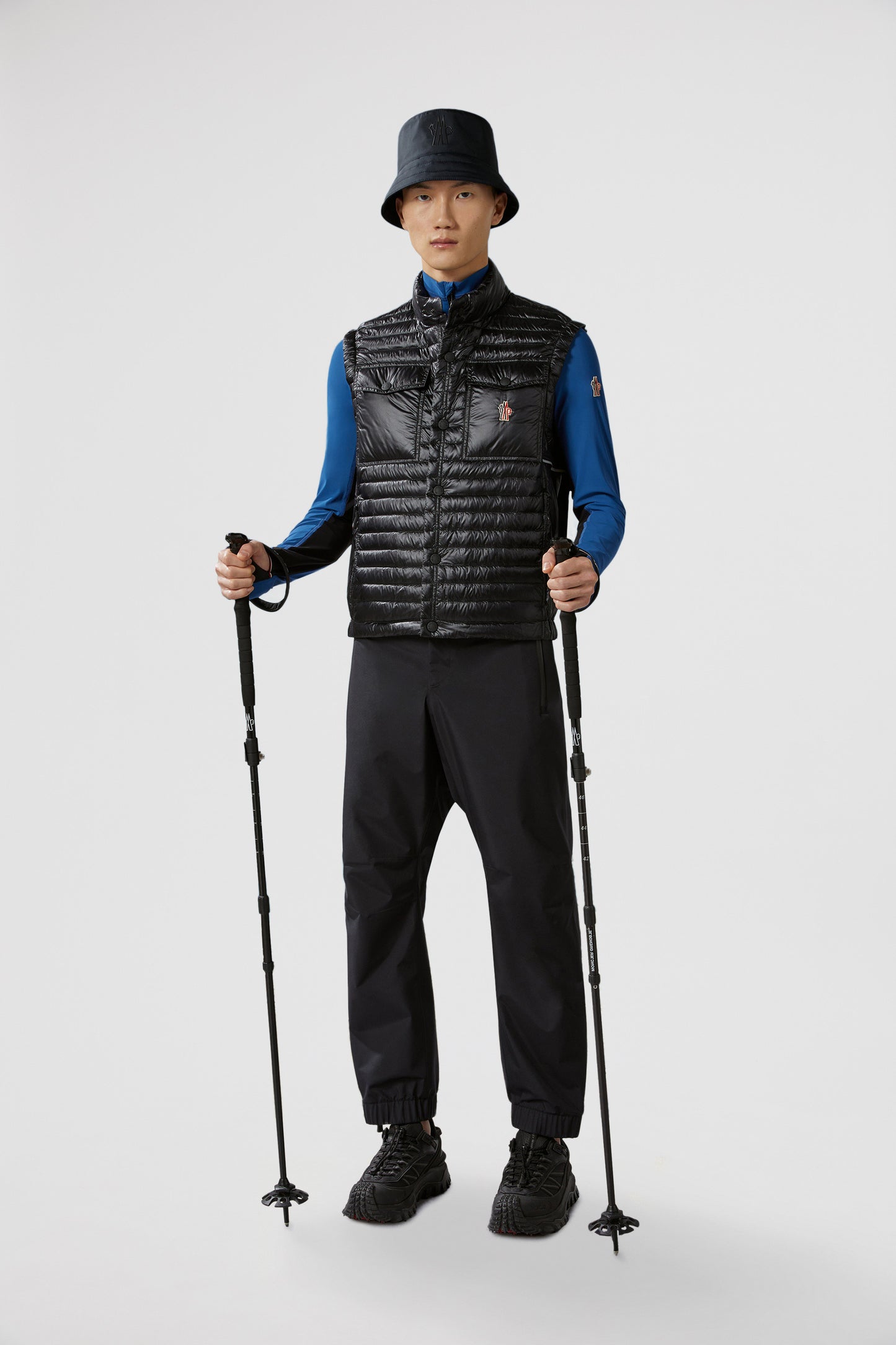 luxury vest, padded nylon vest, Moncler Grenoble vest, black sleeveless jacket, high-end outerwear