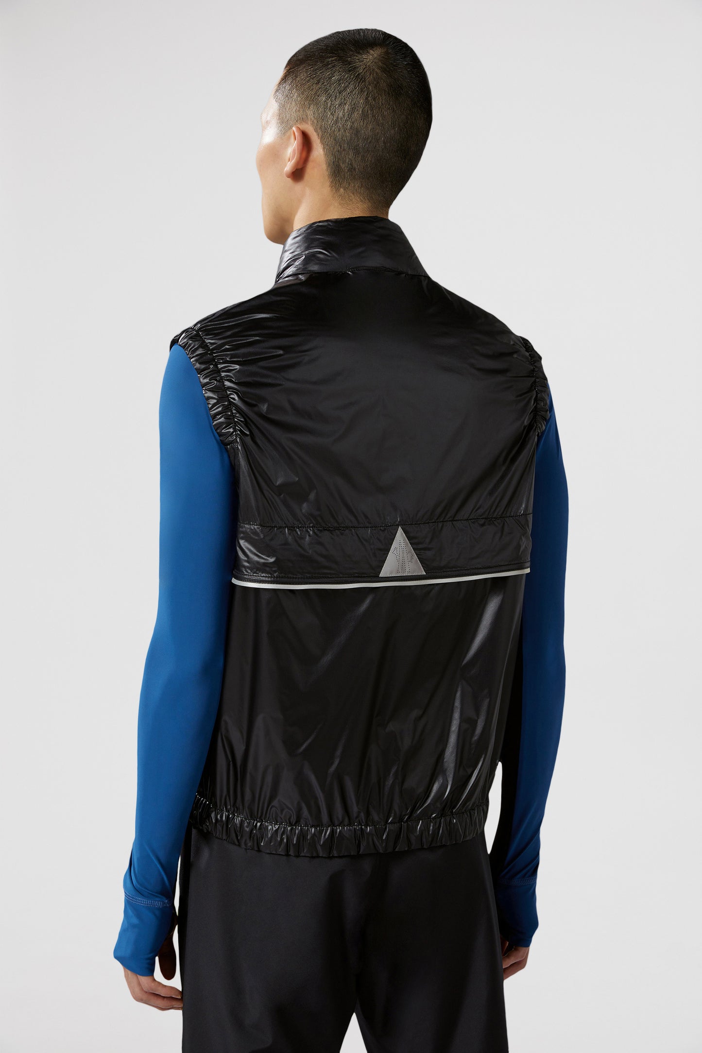 luxury vest, padded nylon vest, Moncler Grenoble vest, black sleeveless jacket, high-end outerwear