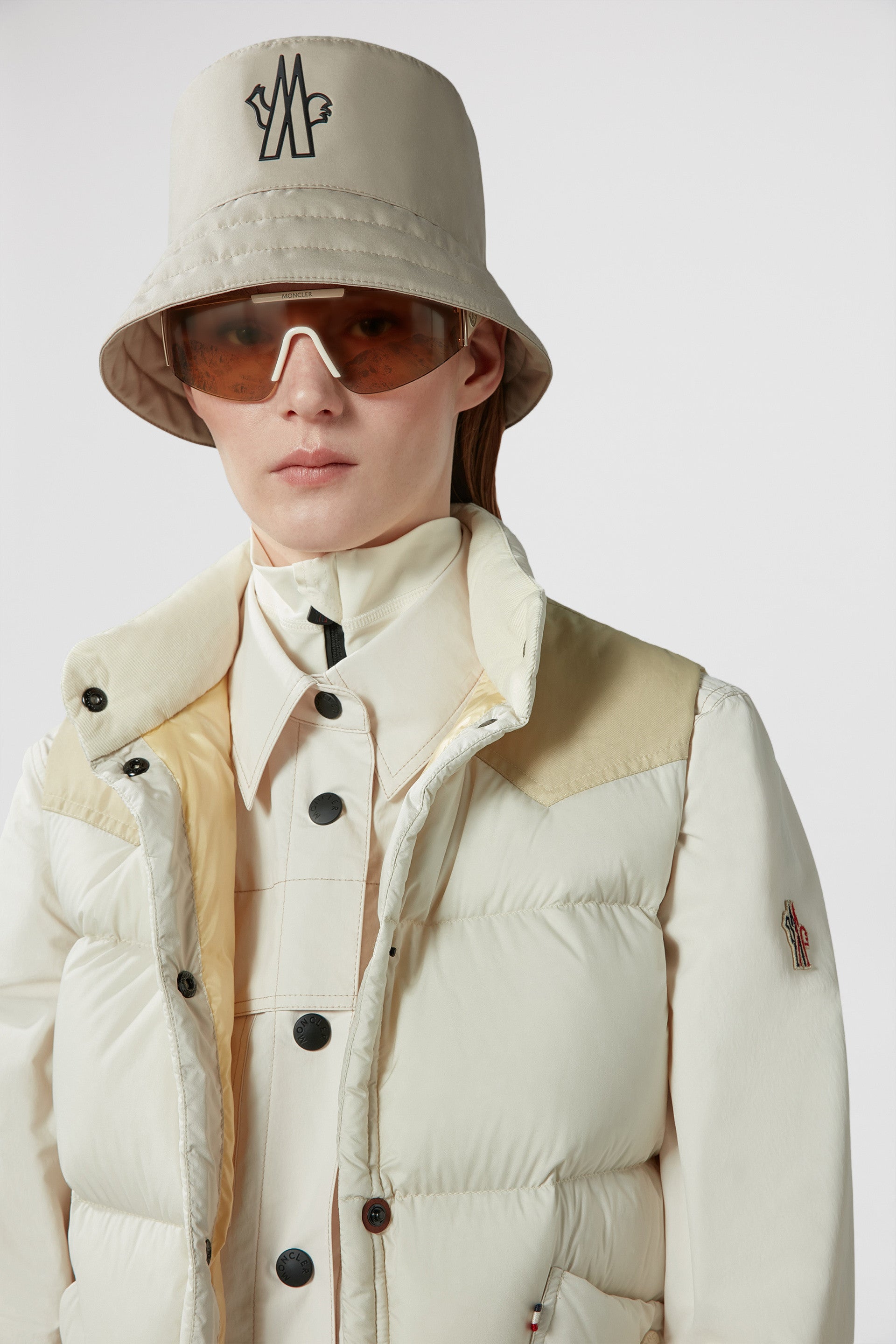 sleeveless puffer jacket, Moncler Grenoble, beige outerwear, luxury winter vest, down-filled jacket