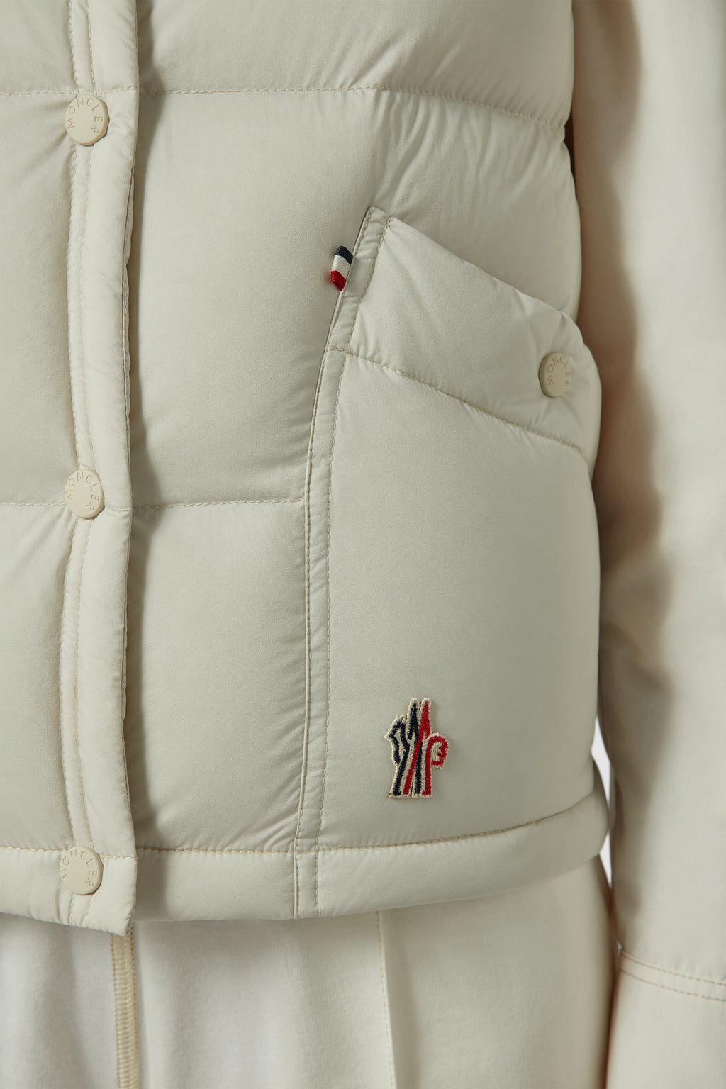 sleeveless puffer jacket, Moncler Grenoble, beige outerwear, luxury winter vest, down-filled jacket