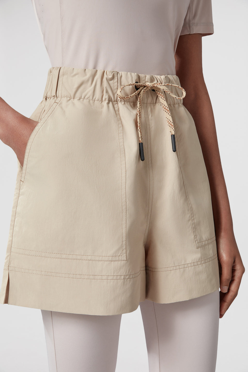 beige nylon shorts, Moncler Grenoble, luxury leisurewear, Spring-Summer 2024, technical crinkled fabric