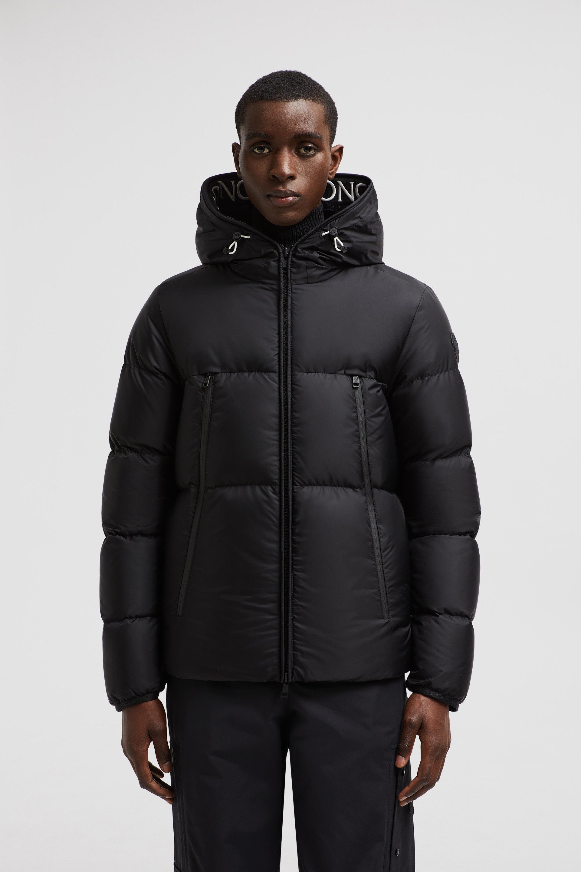 Moncler, puffer jacket, black nylon jacket, winter fashion, luxury outerwear