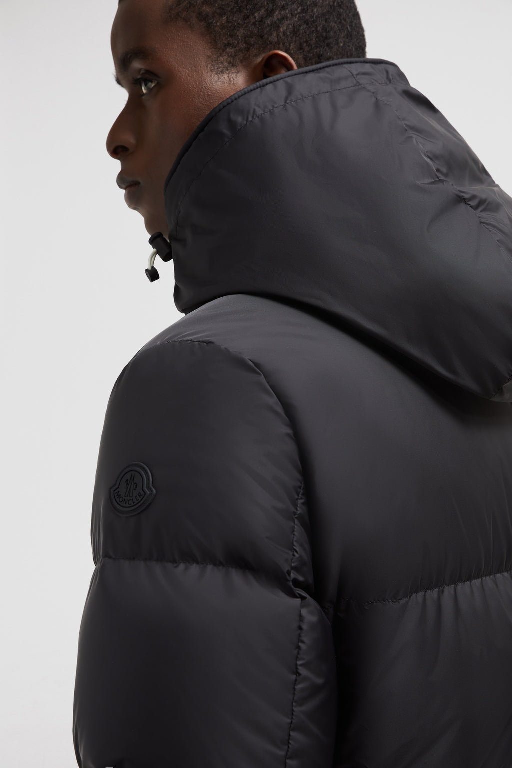 Moncler, puffer jacket, black nylon jacket, winter fashion, luxury outerwear