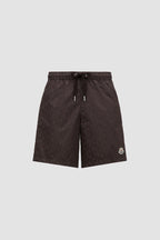 Monogram swim shorts, brown swim shorts, designer swimwear, Moncler shorts, men's swim fashion