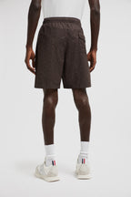 Monogram swim shorts, brown swim shorts, designer swimwear, Moncler shorts, men's swim fashion