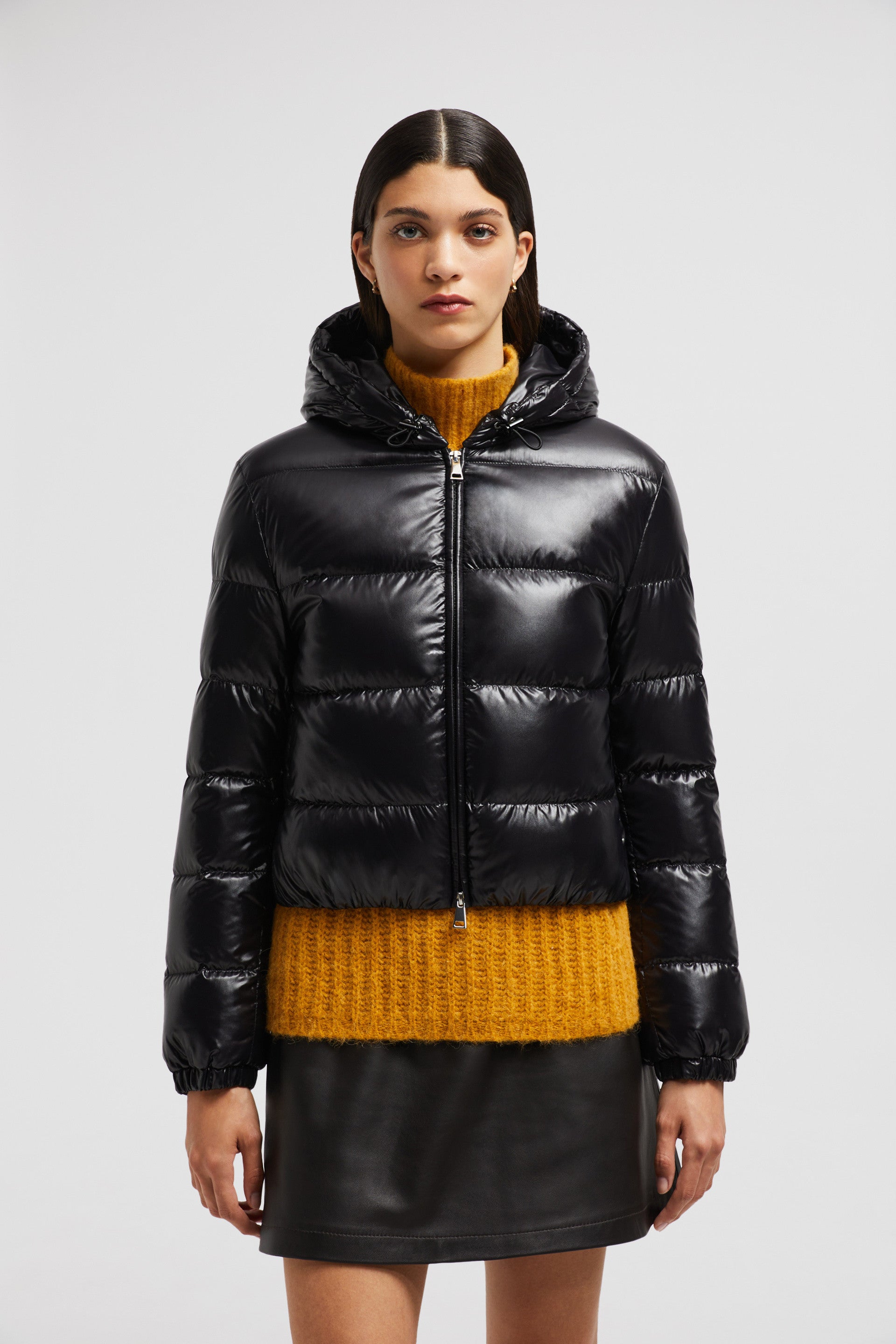 Moncler jacket, luxury outerwear, black nylon jacket, fashionable winter coat, elegant women’s attire