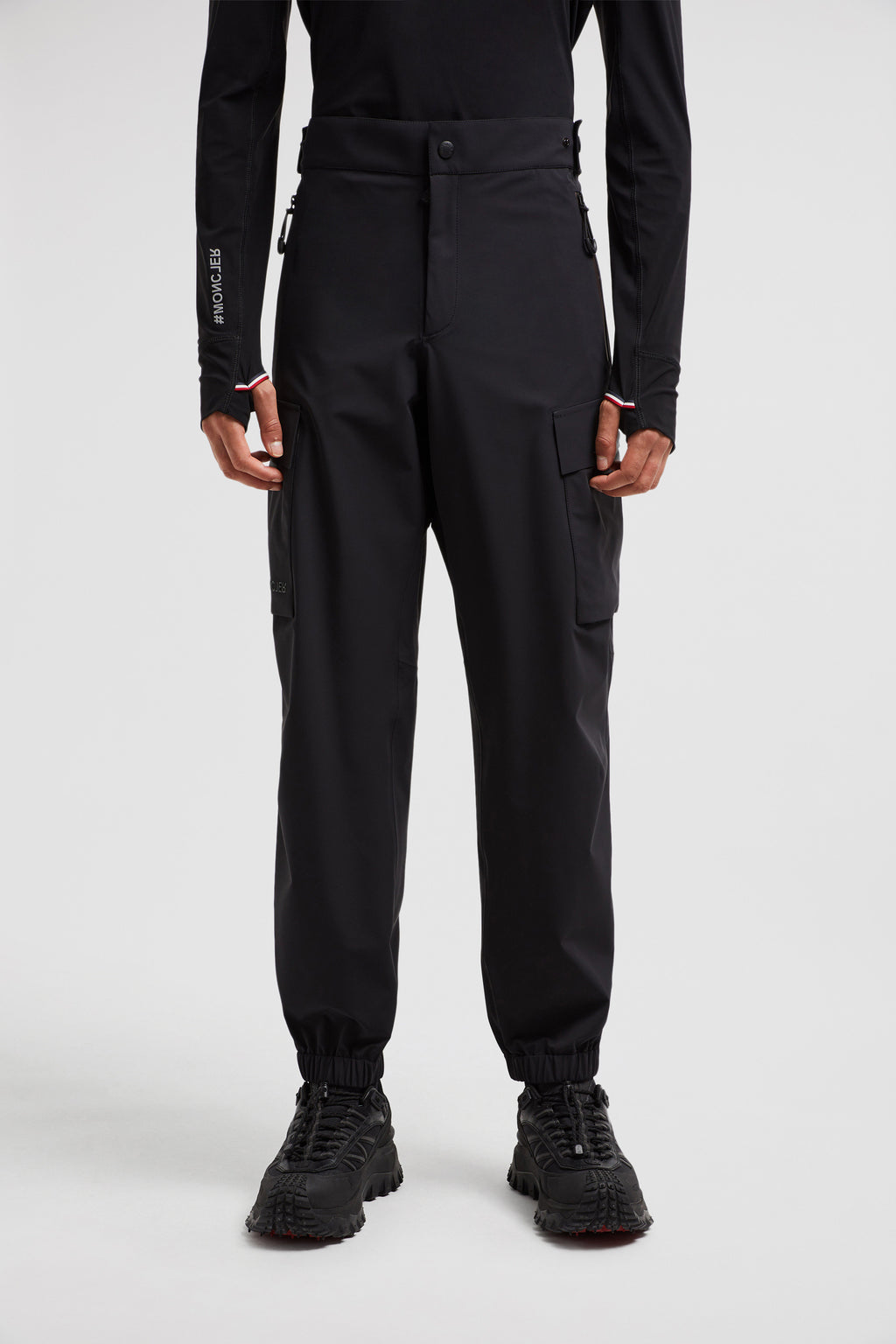 Image of Black Cargo Sport Pants by Moncler Grenoble for Men - Season Autumn-Winter 2024 - Detail View 12