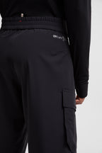Image of Black Cargo Sport Pants by Moncler Grenoble for Men - Season Autumn-Winter 2024 - Detail View 11