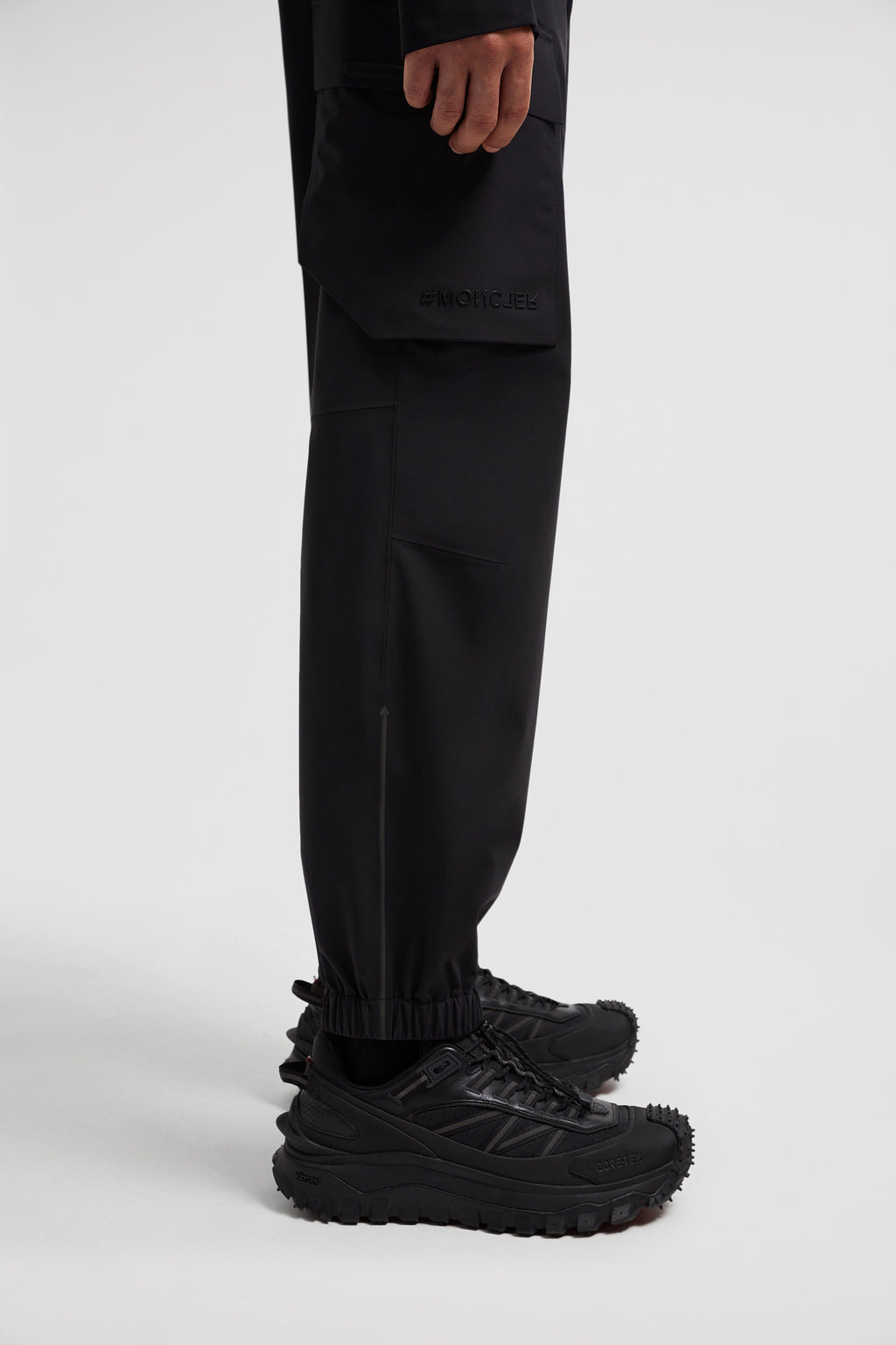 Image of Black Cargo Sport Pants by Moncler Grenoble for Men - Season Autumn-Winter 2024 - Detail View 9