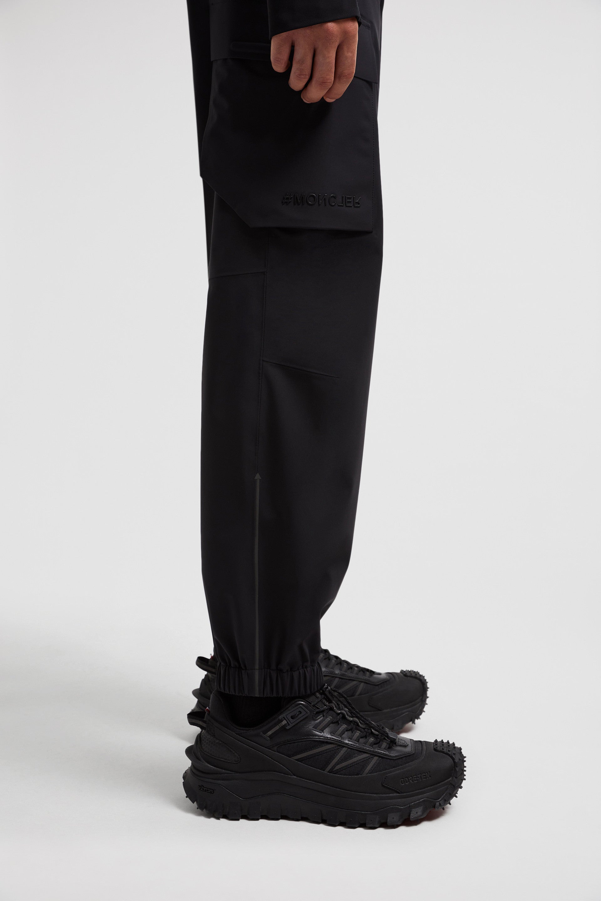 Image of Black Cargo Sport Pants by Moncler Grenoble for Men - Season Autumn-Winter 2024 - Detail View 9