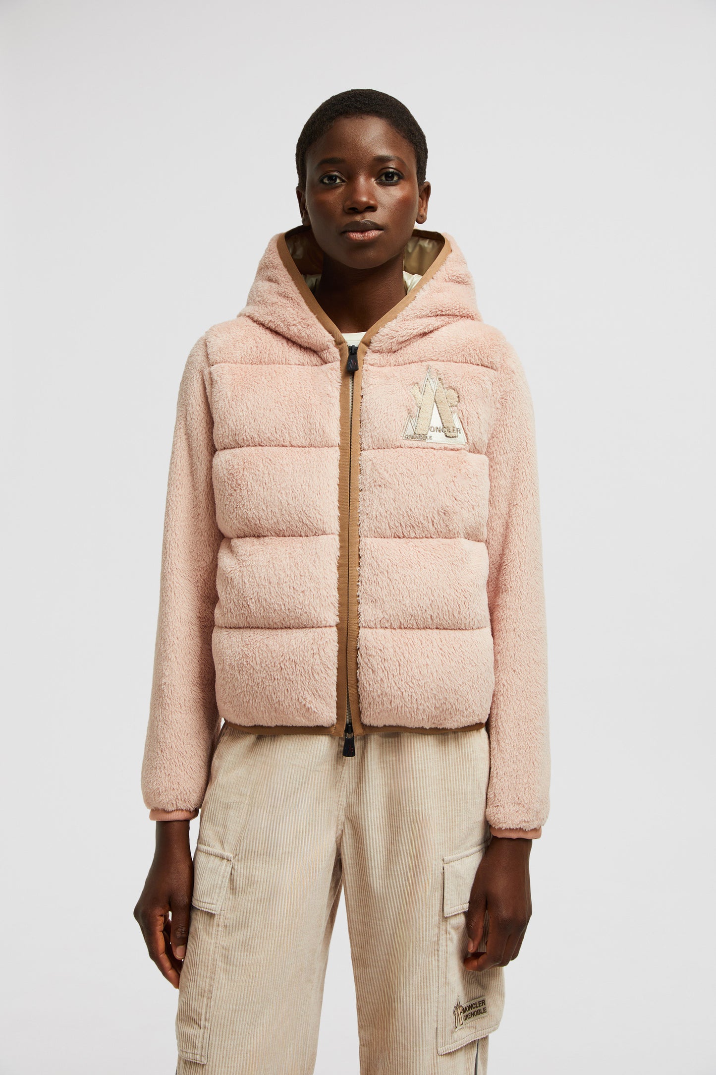 pink fleece jacket, Moncler Grenoble jacket, luxury women's outerwear, bi-material jacket, Autumn-Winter 2024 fashion