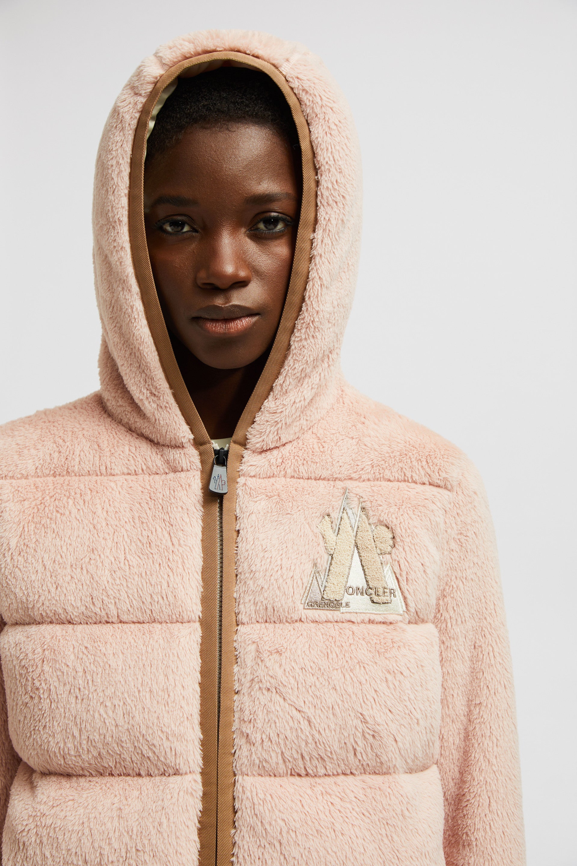 pink fleece jacket, Moncler Grenoble jacket, luxury women's outerwear, bi-material jacket, Autumn-Winter 2024 fashion