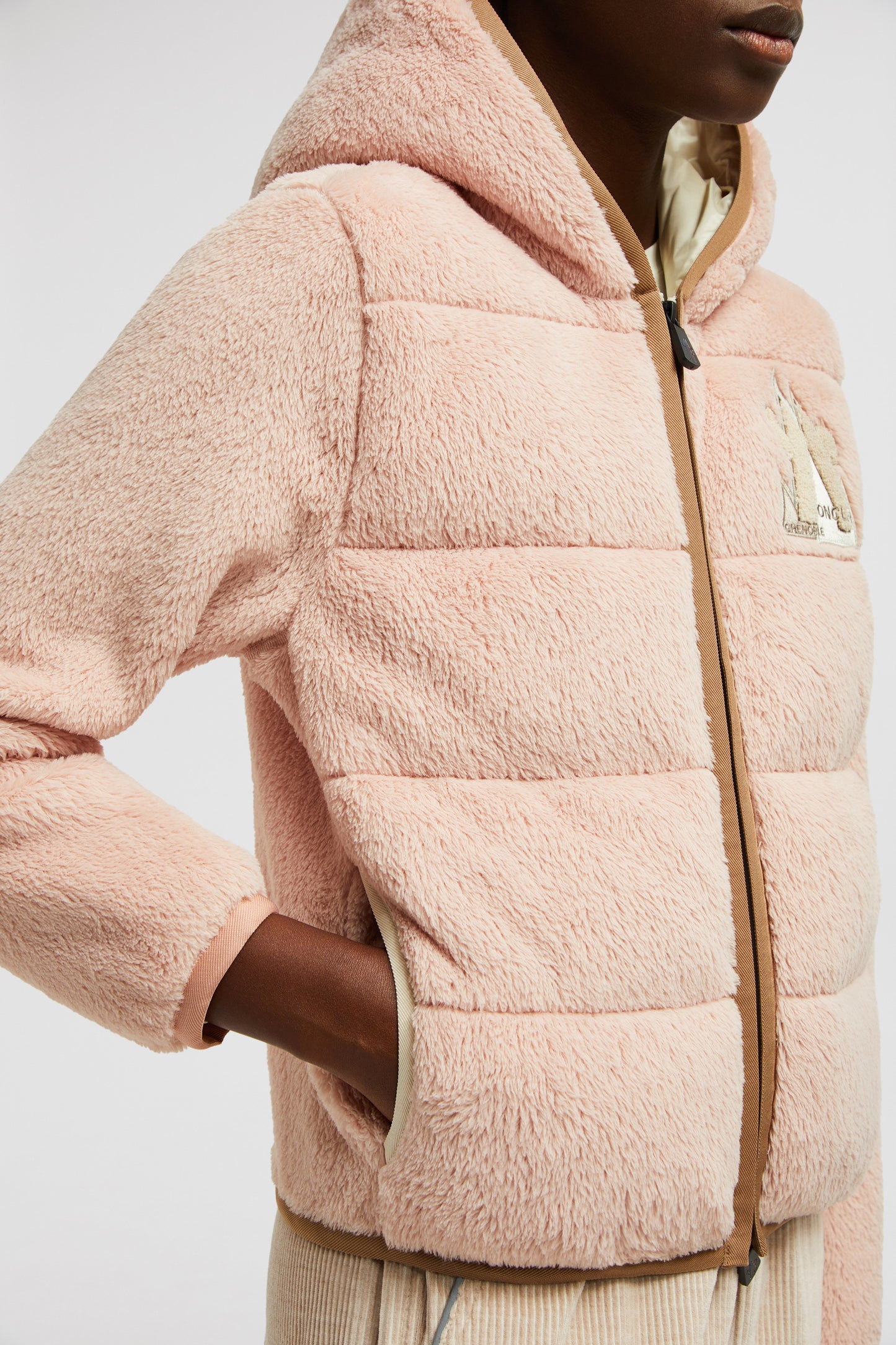 pink fleece jacket, Moncler Grenoble jacket, luxury women's outerwear, bi-material jacket, Autumn-Winter 2024 fashion