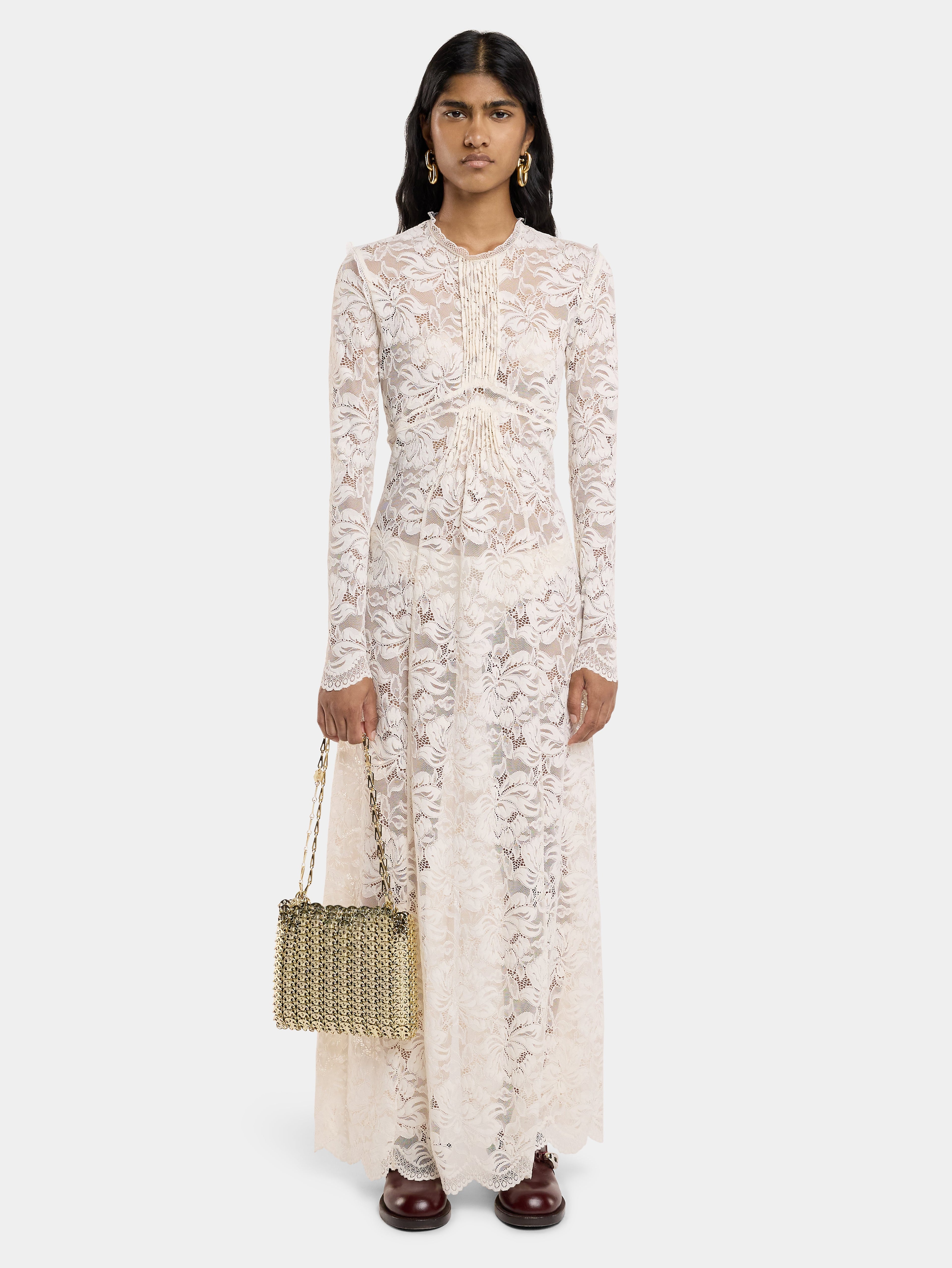 Iconic 1969 bag, metallic bag, Rabanne bag, silver-tone disc bag, high-end fashion