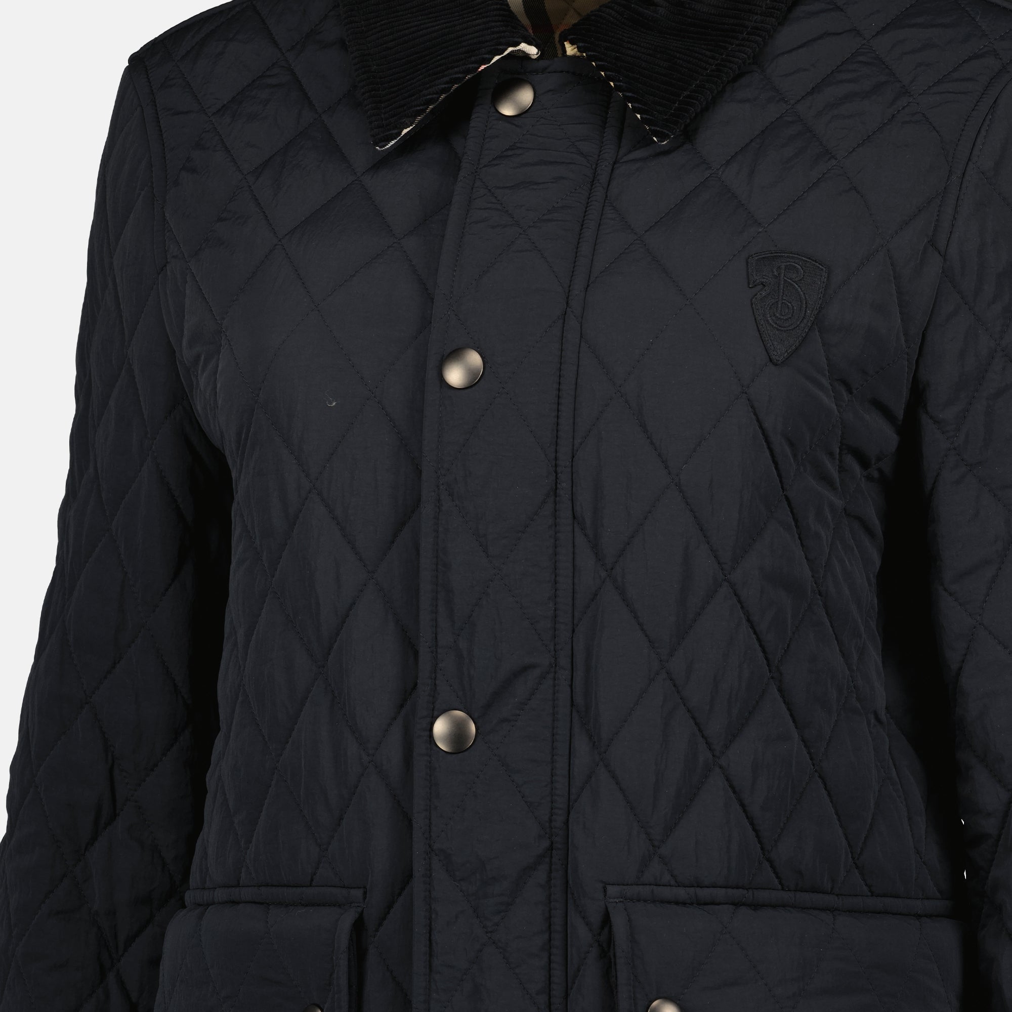 quilted jacket, velvet collar, black outerwear, fall-winter fashion, modern elegance