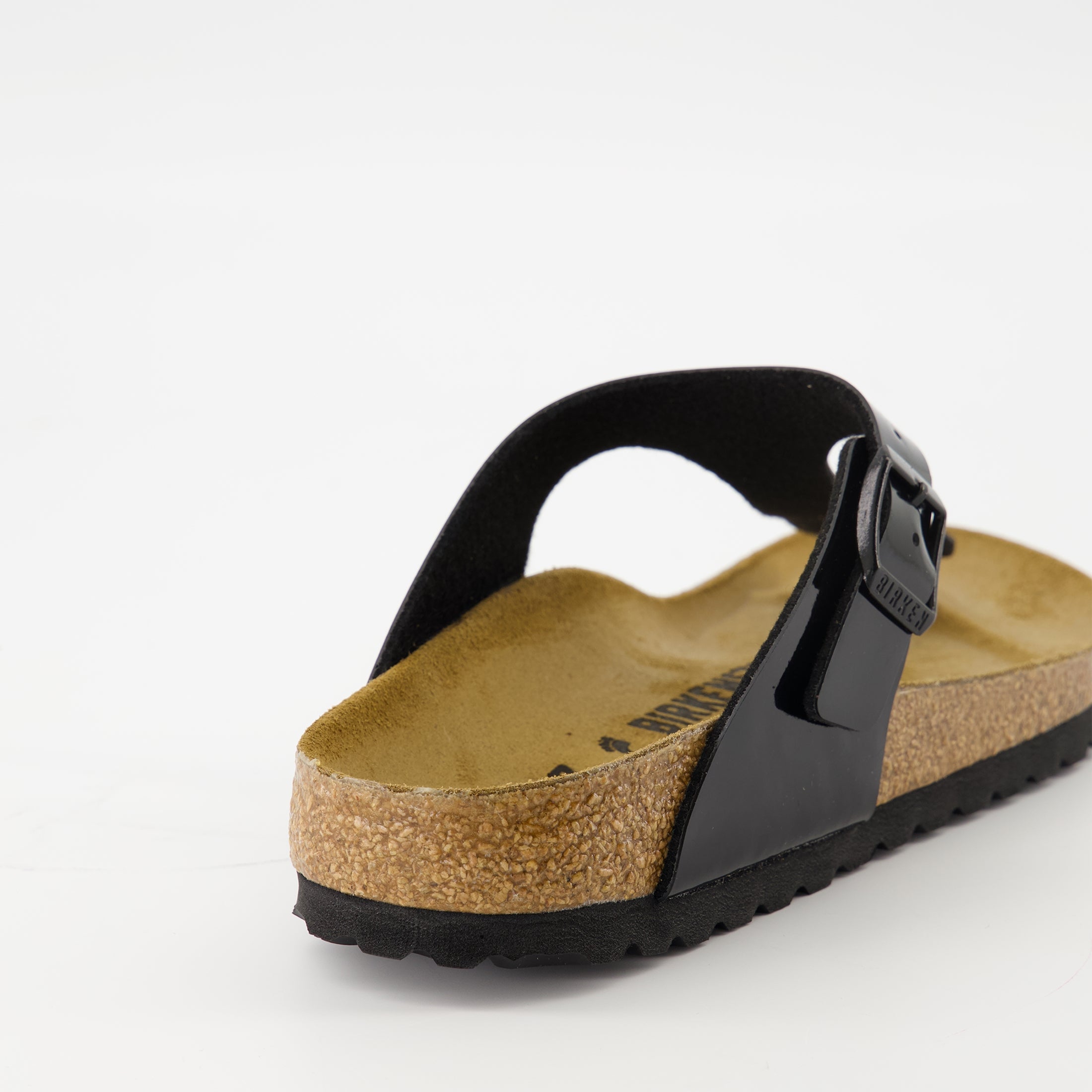 black flip-flops, patent leather sandals, comfortable footwear, adjustable fit sandals, lightweight flip-flops