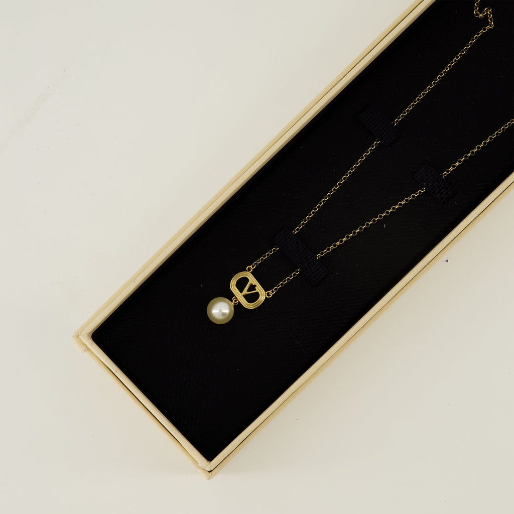 Valentino Garavani necklace, Vlogo pearl necklace, luxury accessories, gold metal jewelry, designer neckwear