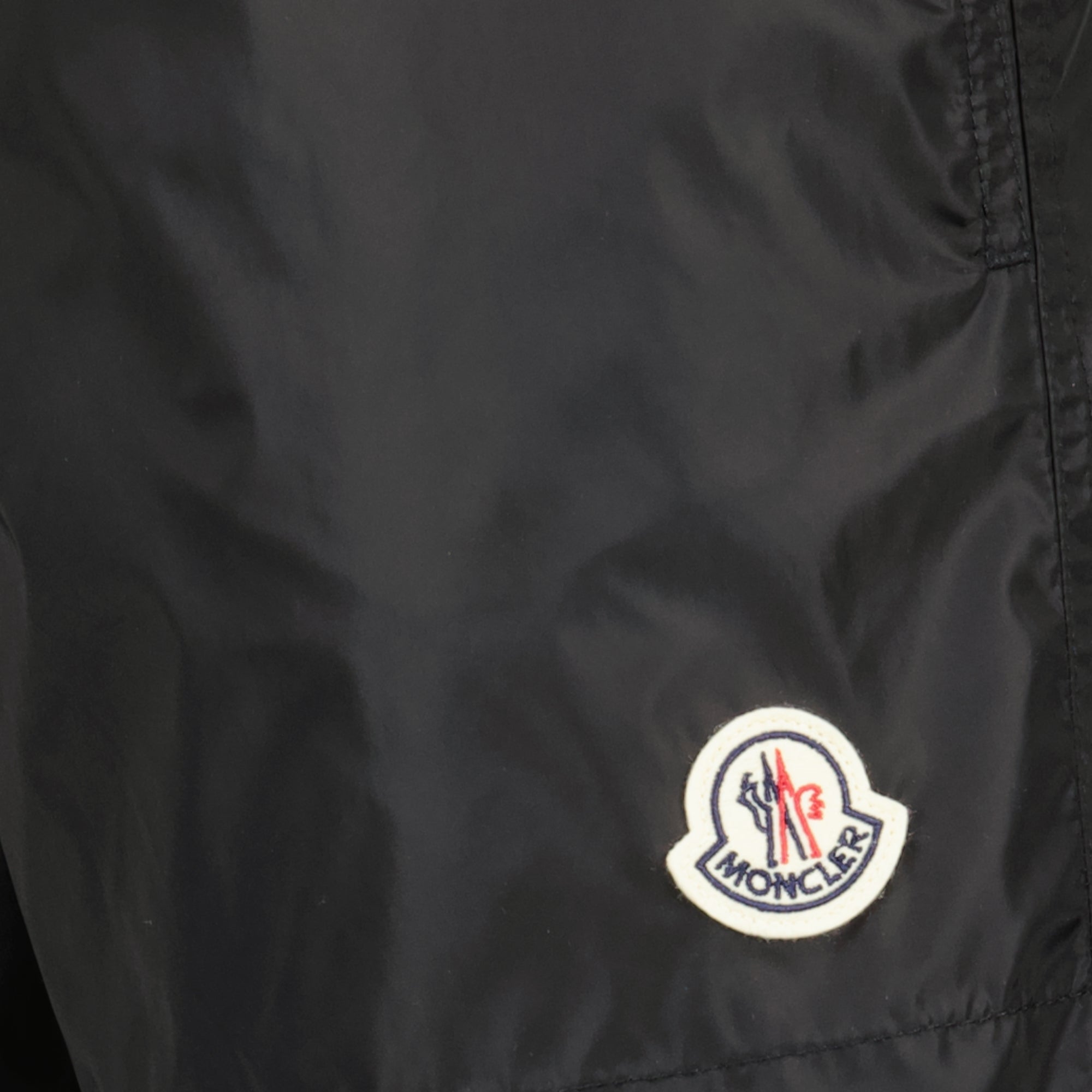 Image of Black Logo Swim Shorts by Moncler for Men - Season Spring-Summer 2026 - Detail View 1