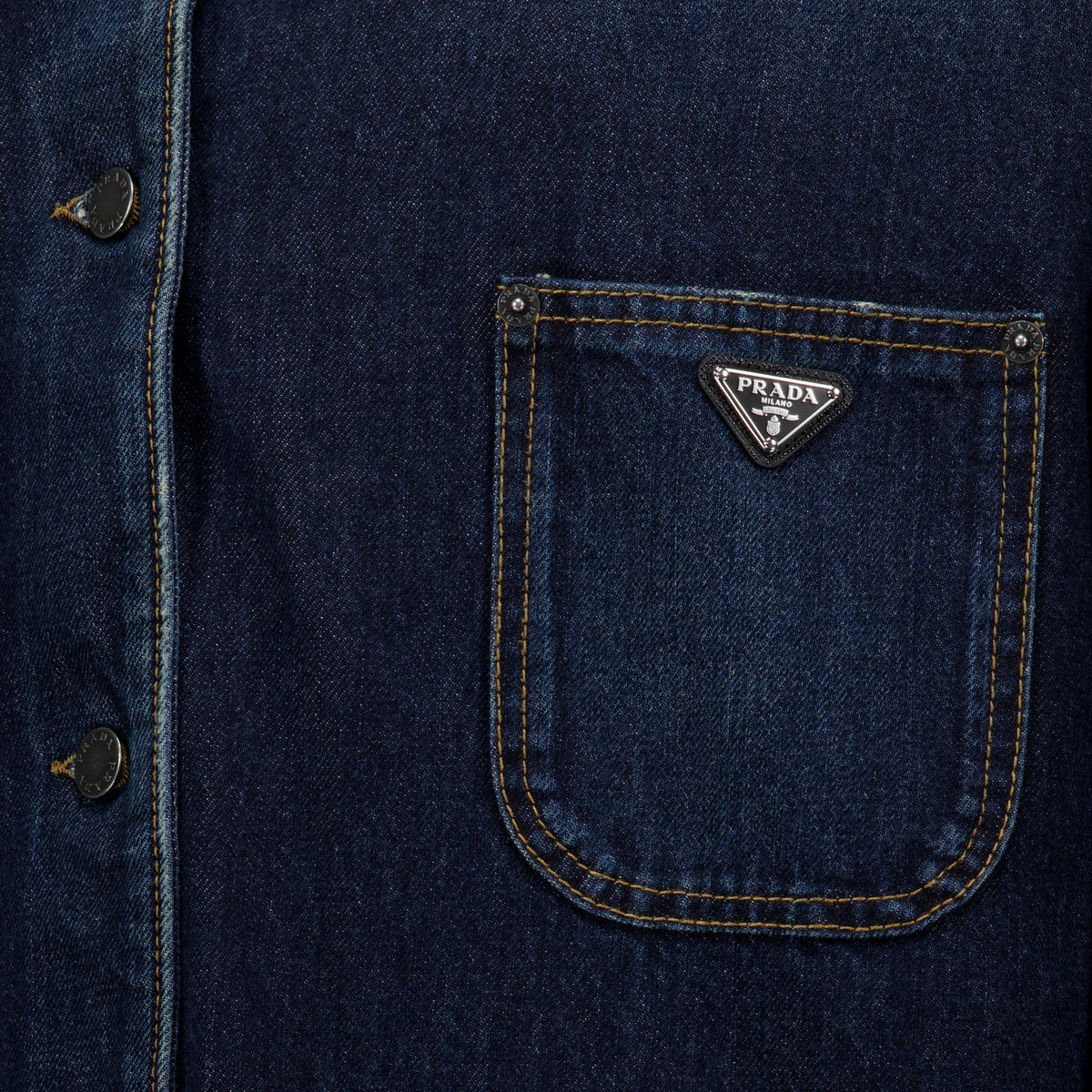 Mørkeblå denim- og skinnjakke