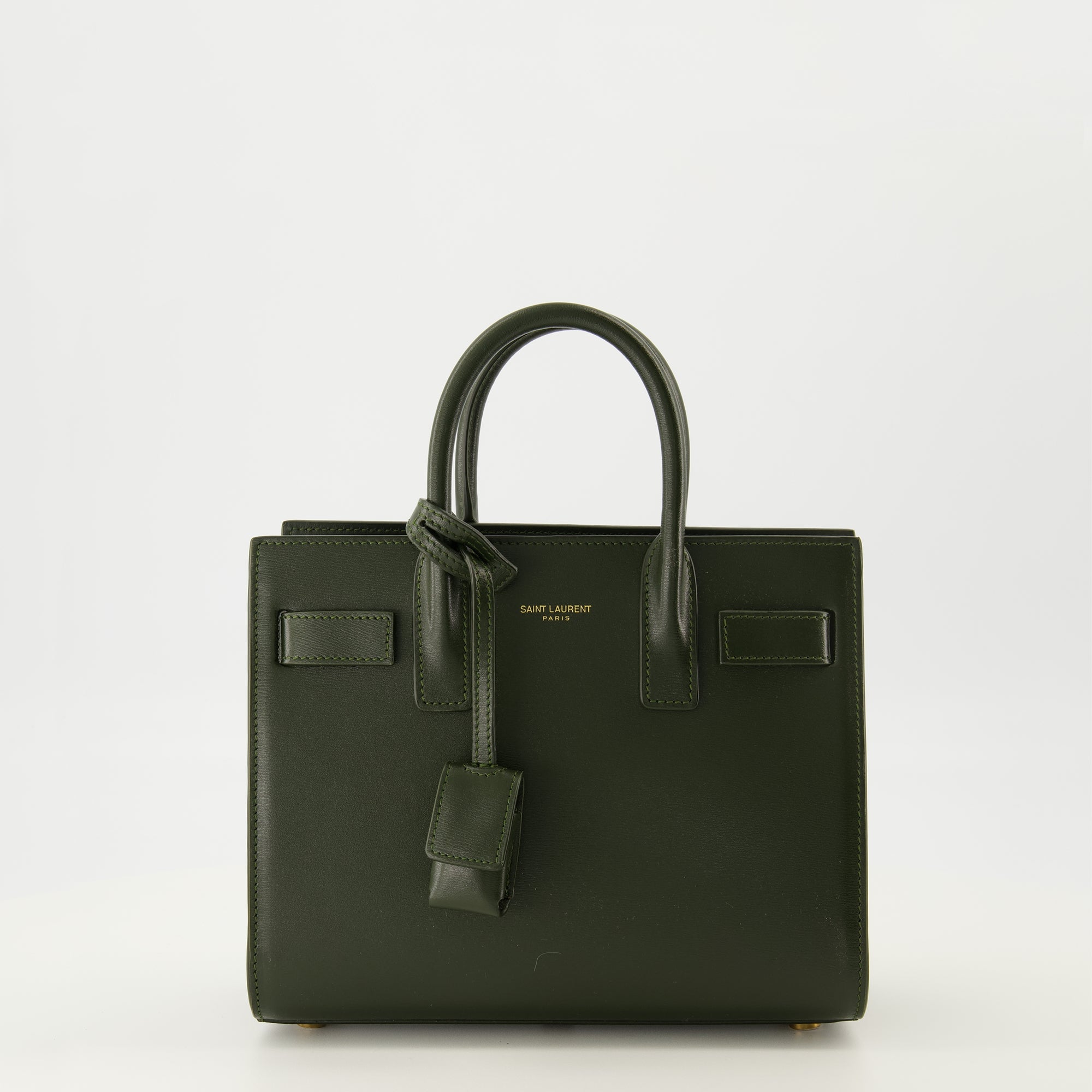 green handbag, Saint Laurent, smooth calf leather, structured design, fashion accessory