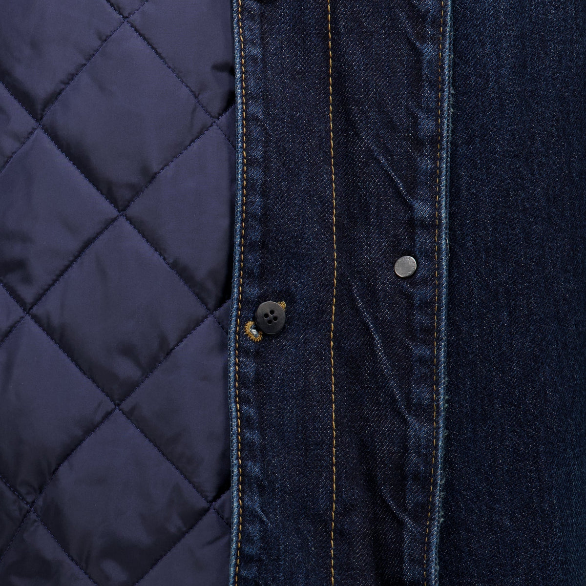 Mørkeblå denim- og skinnjakke