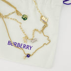 Bild der doppeltsträngigen Goldanhänger-Halskette von Burberry für Damen - Saison Herbst-Winter 2025 - Detailansicht 1