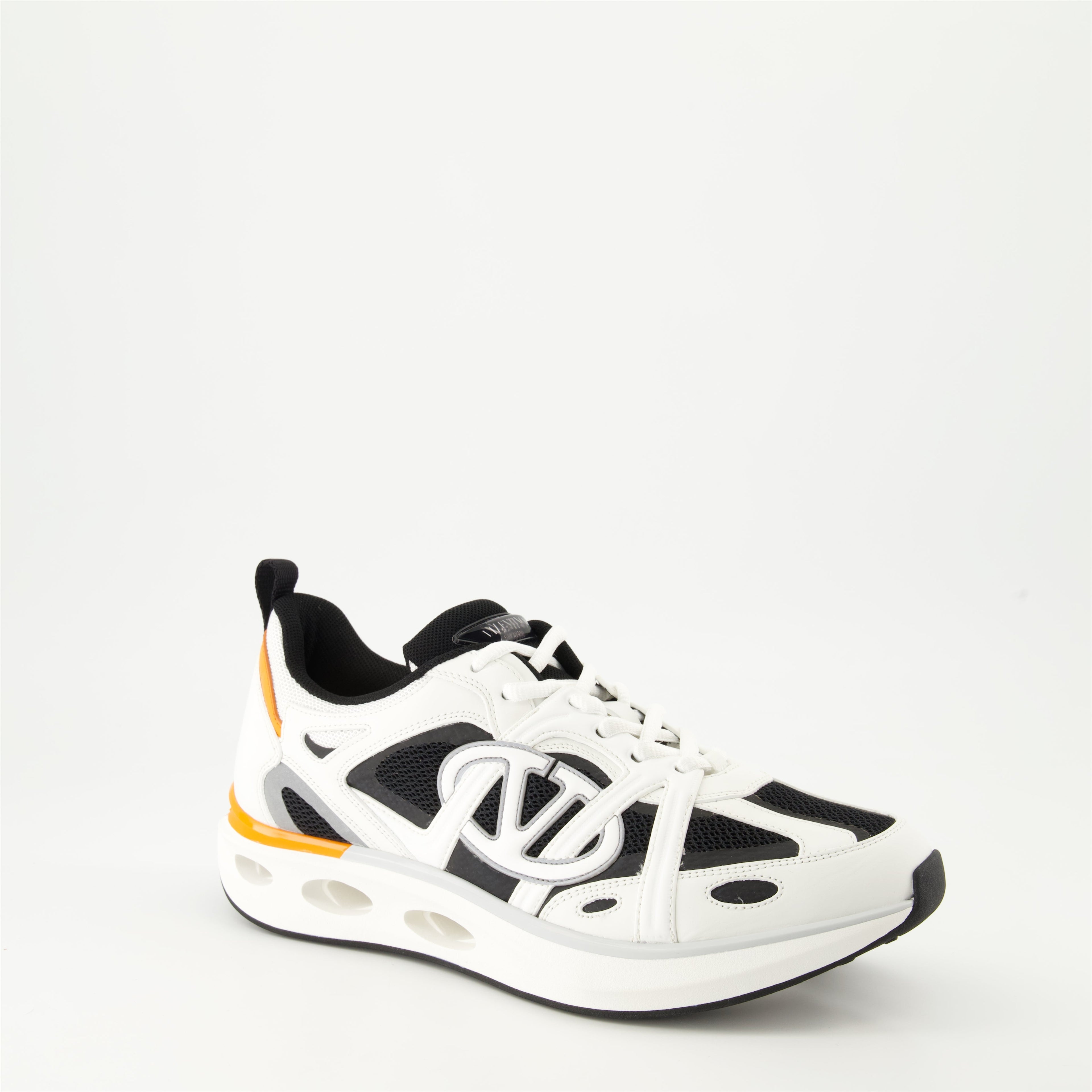 Image of White and Black VLogo Easyjog Sneakers by Valentino Garavani for Men - Season Autumn-Winter 2024 - Front Right Three-Quarter View