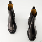 Imagen de botines de cuero negro de Tod's para mujeres - Temporada Otoño-Invierno 2025 - Vista superior del par