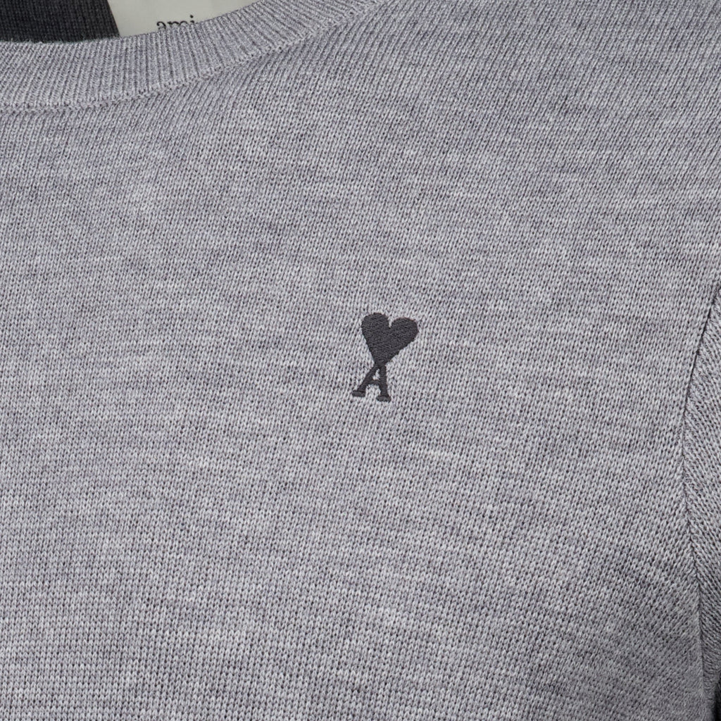 Maglione in lana grigia con logo ricamato