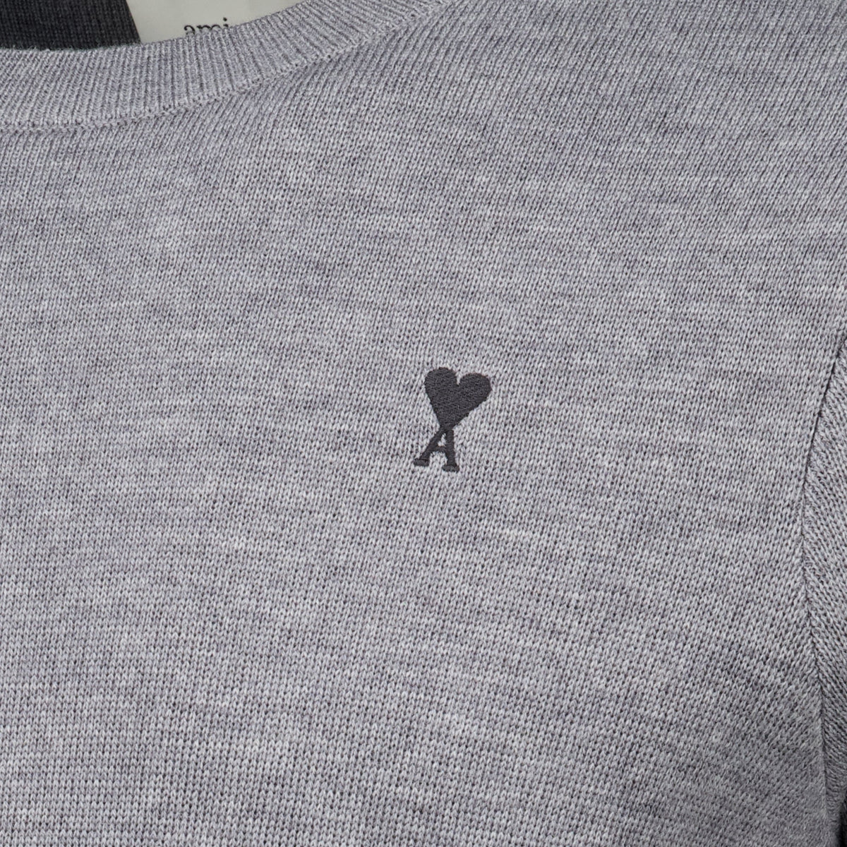 Maglione in lana grigia con logo ricamato