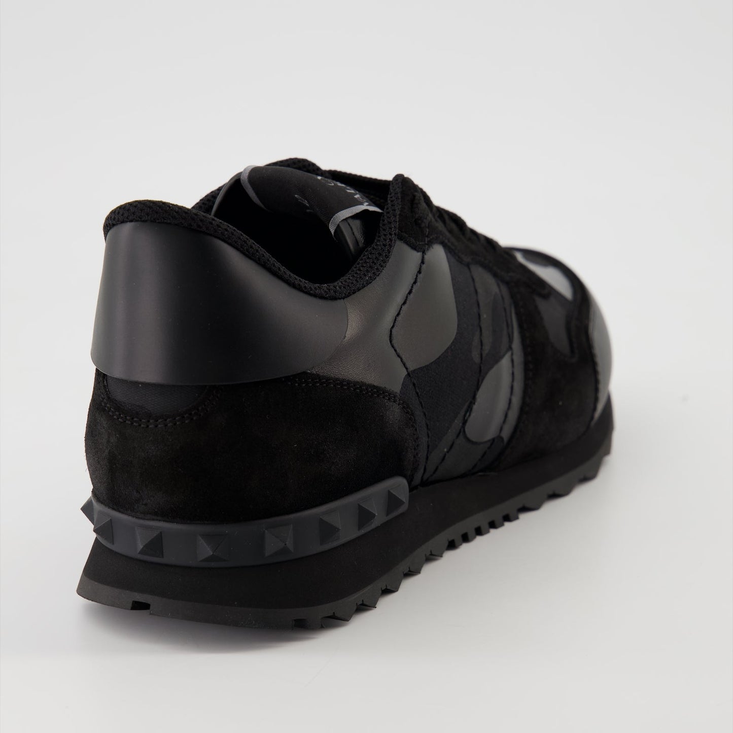 Valentino Garavani sneakers, Rockrunner leather sneakers, luxury footwear, black suede sneakers, high-end sneakers