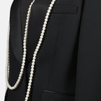 Image de Blazer Noir avec Perles par Moschino pour Femmes - Saison Printemps-Été 2025 - Détail 2