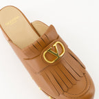 leather clogs, VLogo shoes, luxury footwear, fringe design, Italian fashion