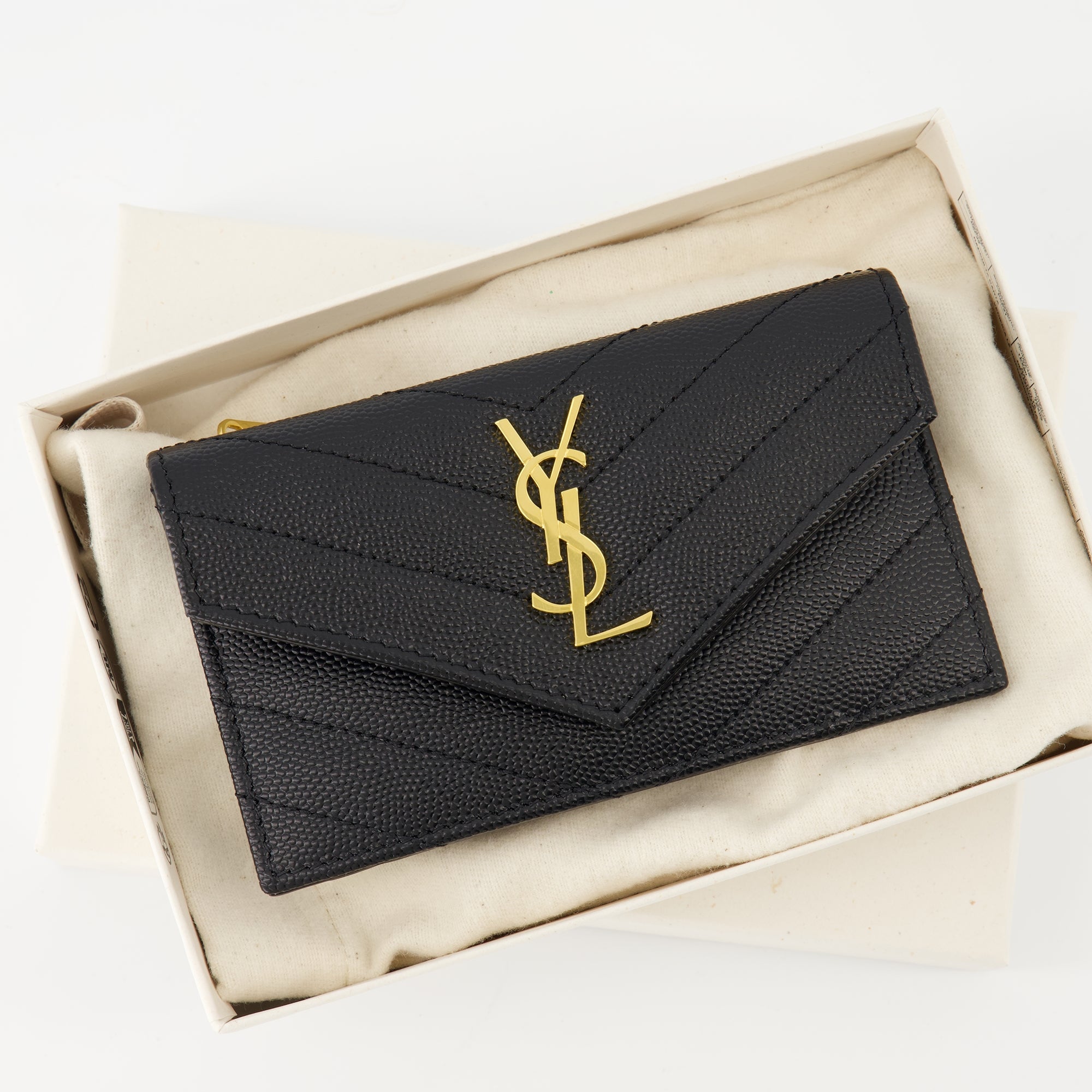 black cardholder, Saint Laurent, textured leather accessory, YSL logo, luxury cardholder