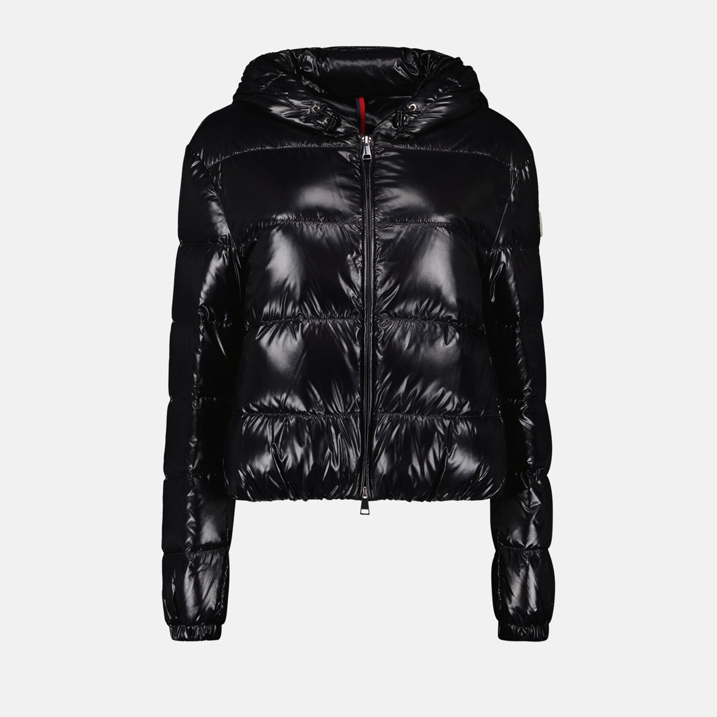 Moncler jacket, luxury outerwear, black nylon jacket, fashionable winter coat, elegant women’s attire