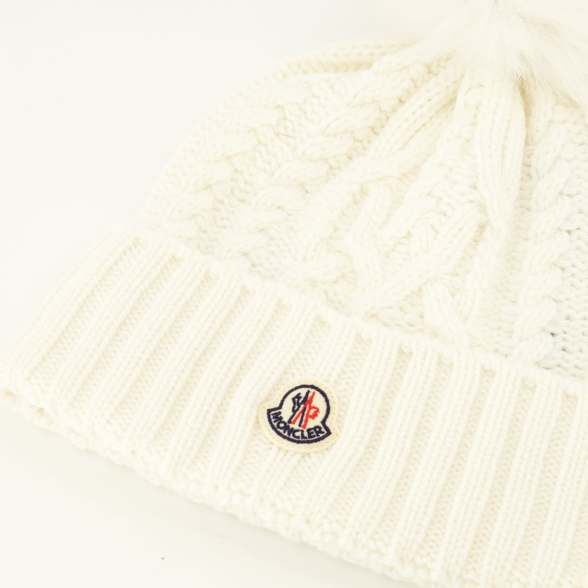 Berretto bianco in cashmere a trecce