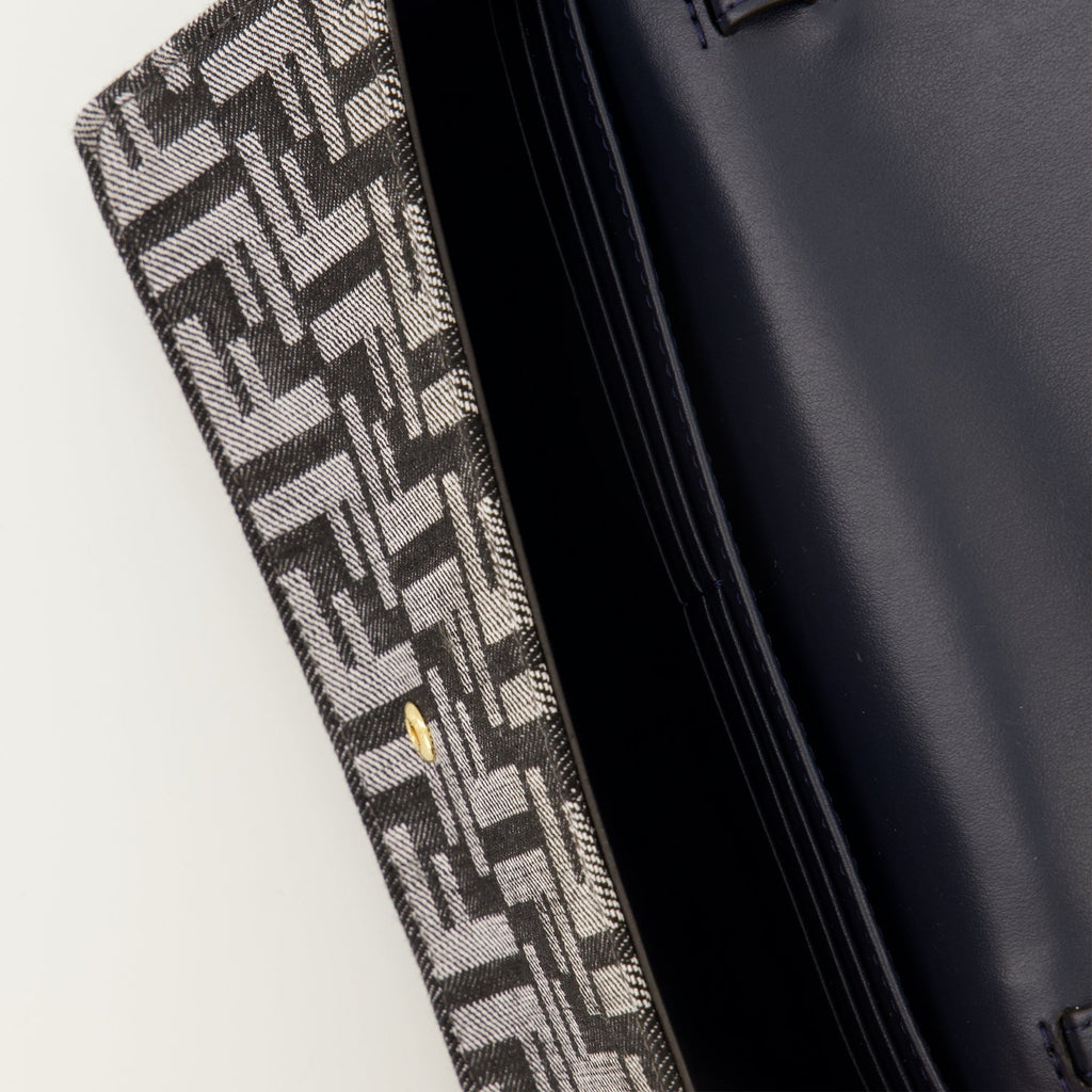 Fendi baguette wallet, denim wallet, designer accessories, chic handbag, Autumn-Winter collection 2025