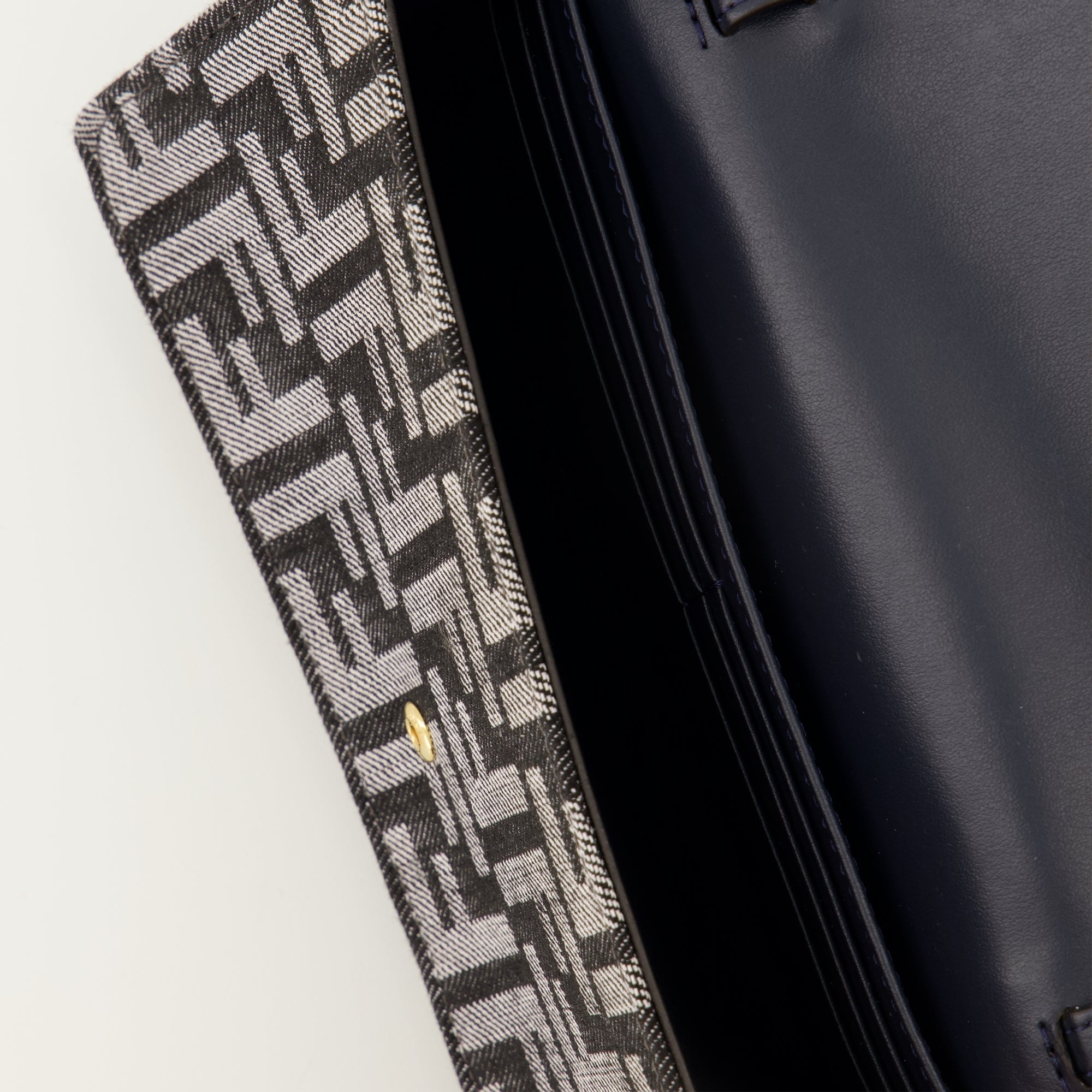 Fendi baguette wallet, denim wallet, designer accessories, chic handbag, Autumn-Winter collection 2025