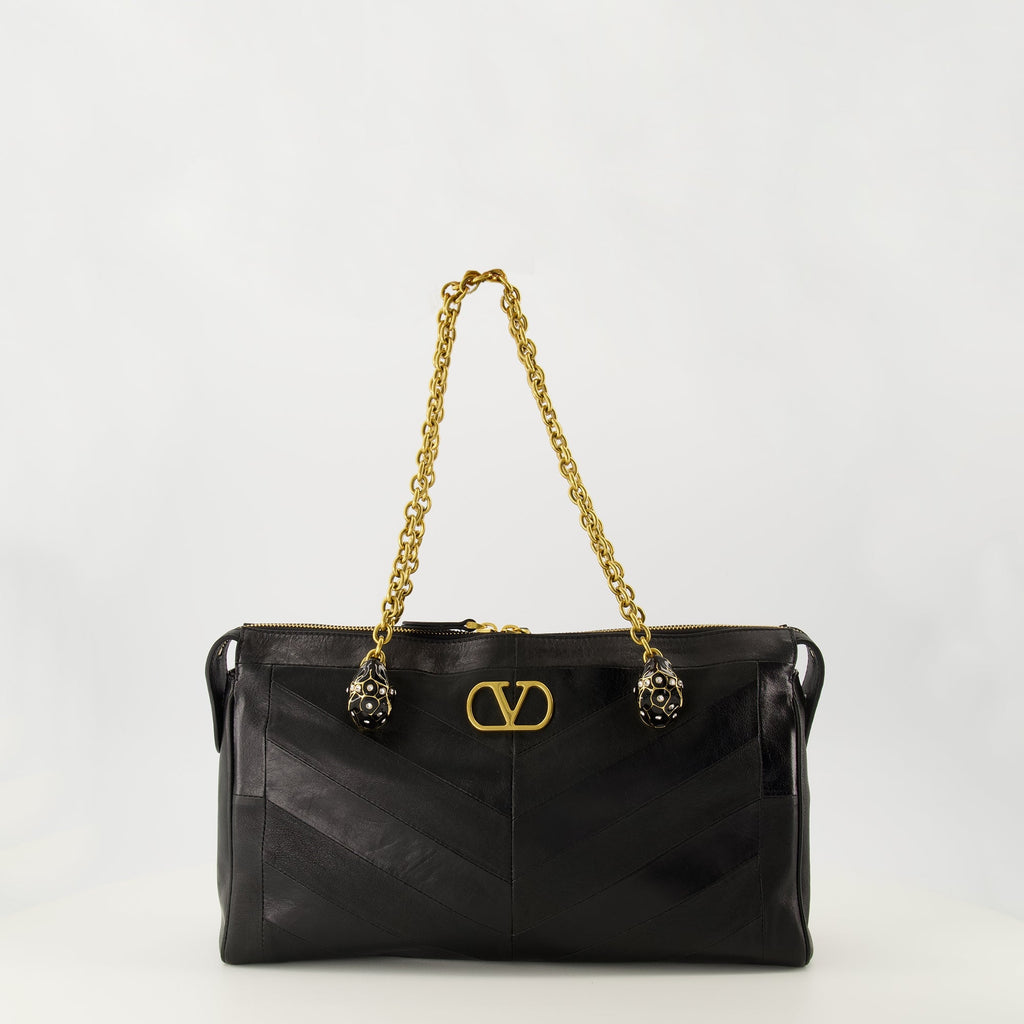 black leather bag, Valentino Garavani, nappa leather, designer bag, luxury accessory