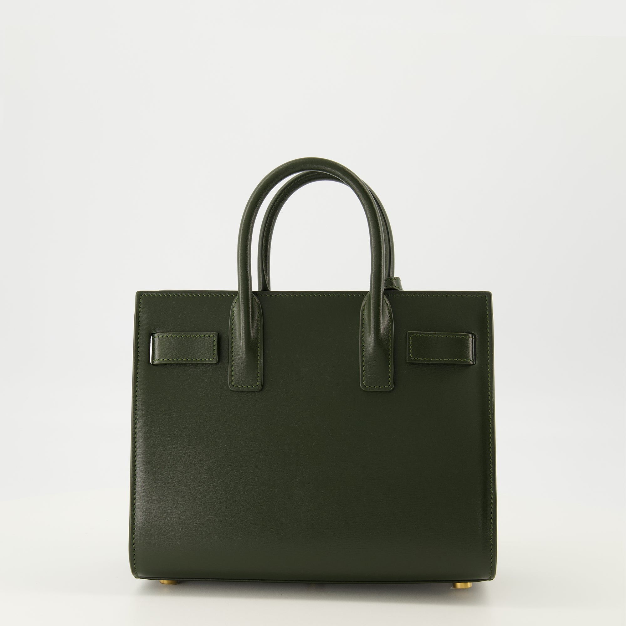 green handbag, Saint Laurent, smooth calf leather, structured design, fashion accessory